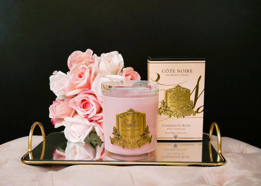 Pink Champagne Candle Pink Vessel with Gold Badge