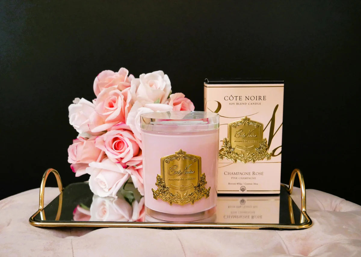 Pink Champagne Candle Pink Vessel with Gold Badge